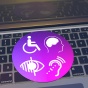 A keyboard with icons for disability overlayed on-top. 