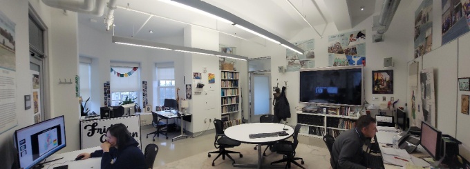 People working in the main office of the center. 