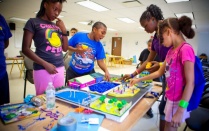 Elementary students participating in an educational design exercise for the future of cities and urban spaces. 
