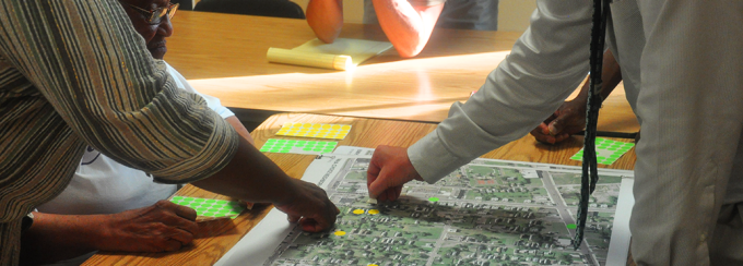 Students interacting with a map. 