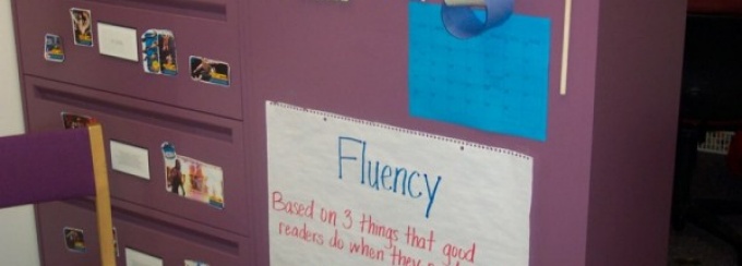 Zoom image: This tutoring area is home to an 8th grader who loves football. His clinicians not only decorated the area with football pictures, but also incorporated a football theme to many activities. 