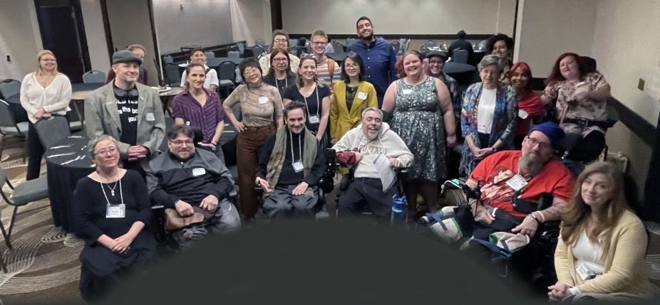 Group photo at the Communities of Care Symposium 2025. 