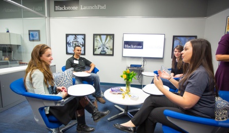 UB community members meeting at the Blackstone Launchpad office. 
