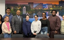 CPMC students and staff stand alongside Dean Alford. 
