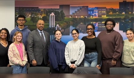 CPMC students and staff stand alongside Dean Alford. 