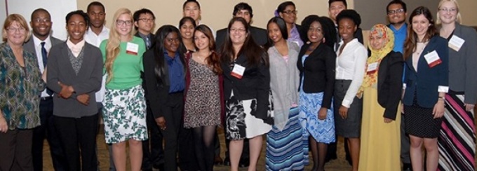 A large group of McNair scholars and staff pose for a picture. 