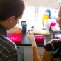 Photo of a student and teacher working on an experiment. 