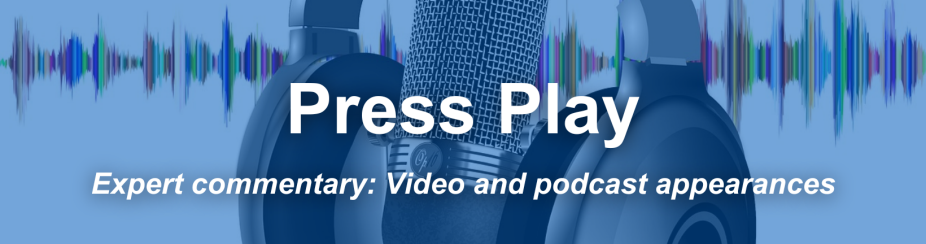 Photo of a podcast microphone and headset. 