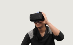 Student wearing virtual reality headset. 