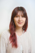 Headshot of Grace Trietley.