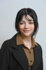 Headshot of Queens Mohi.