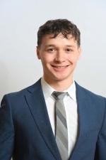 Headshot of Maxwell Mortillaro.