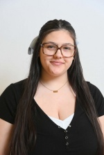 Headshot of Julia Gueli.