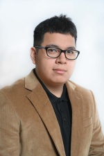 Headshot of William Ramos.
