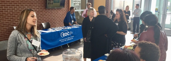 BEOC Alumni mingle during a social hour. 