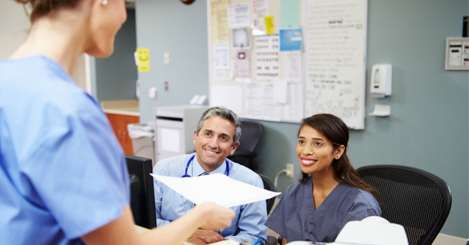 Medical Billing and Coding Specialists smiling. 