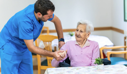 PCA (Personal Care Assistant) helping a person. 