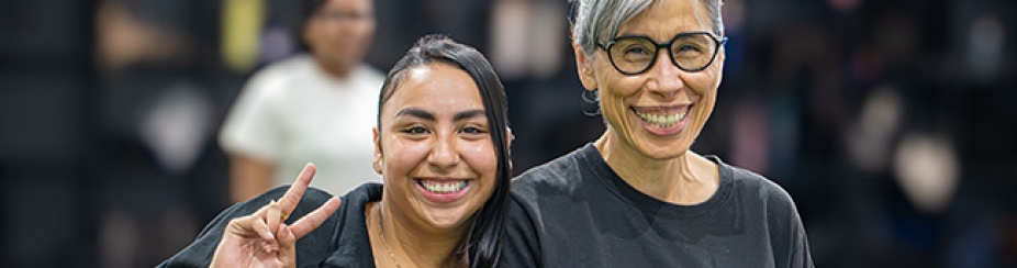 Community ambassador and EOP director smiling.