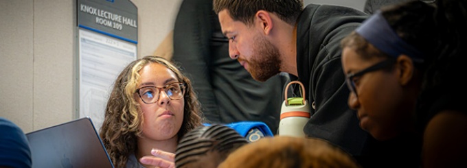 Student speaking with a Campus Ambassador.