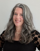 Headshot of Lia Hallett, Exploring Alternatives Coordinator and Senior Academic Advisor. 