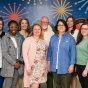 Exploratory and Pre-Professional Advising Center staff standing for picture and looking at camera in Capen Hall. 