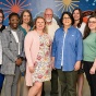 Exploratory and Pre-Professional Advising Center staff standing for picture and looking at camera in Capen Hall. 