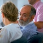 Two faculty members talking. 