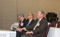Zoom image: From left to right: Charles Zukoski, President Satish Tripathi, and Peter Kneupher 