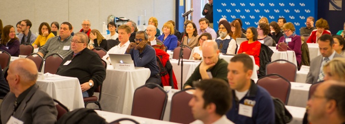 Participants in a 2016 Faculty Senate meeting. 