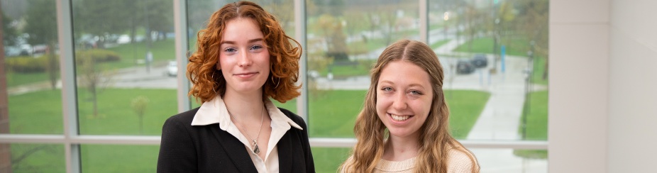 Two goldwater recipients pose in front of a window. 