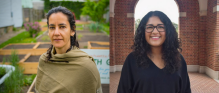 Photo shows two people smiling at the camera. 