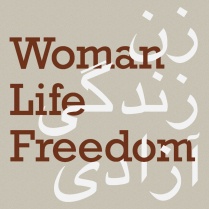 Photo says Woman Life Freedom. 