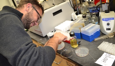 UB Law student learns in science lab. 