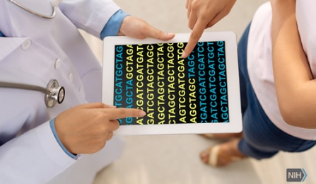 Doctor and patient looking at genetic code. 