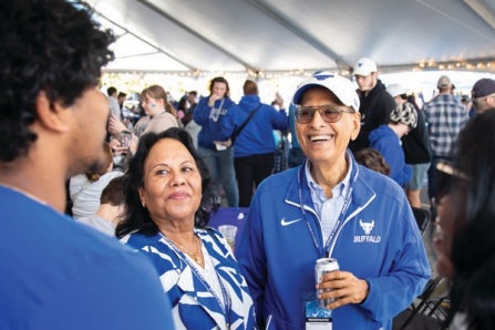 President Tripathi greets families during Homecoming and Family Weekend tailgating area. 