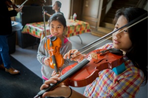 Children practicing violin at Buffalo String Works Credit: Douglas Levere | University at Buffalo. 