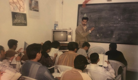 Ali teaching in Iraq. 