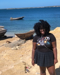 Samendy Brice standing in Haiti. 