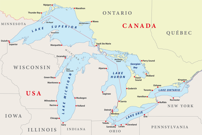 A map of the Great Lakes in The U.S. and Canada. The map is flat and highlights the different states, cities and provinces that touch each of the Great Lakes. 