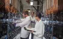 Two UB faculty members and a student work in a pumping station near Lake Erie. 