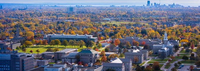 An aerial perspective of South Campus with downtown Buffalo in the distance. 