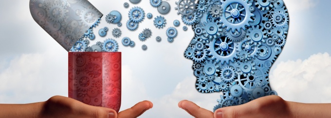Illustration of a drug capsule flled with gears spilling out to form the shape of a human head. 