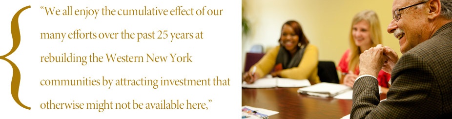 man and two women sitting at a meeting table and a quote that says "we take satisfaction in seeing families happy to be in their new homes, paying affordable rents, paying lower utility costs because the appliances are all energy-efficient". 