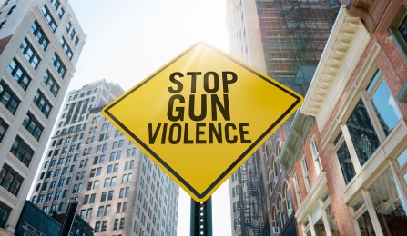street sign reading stop gun violence. 