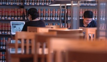 Students studying in Charles B. Sears law library. 