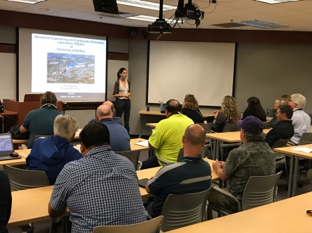 Dr Pinar Okumus preparing NYSATE conference participants for a tour of the earthquake simulation lab. 