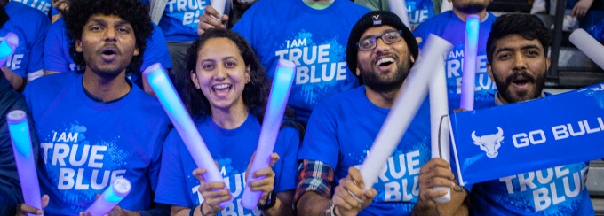 A group of students smiling. 