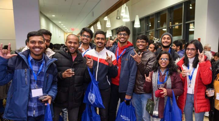 Group of students smiling. 