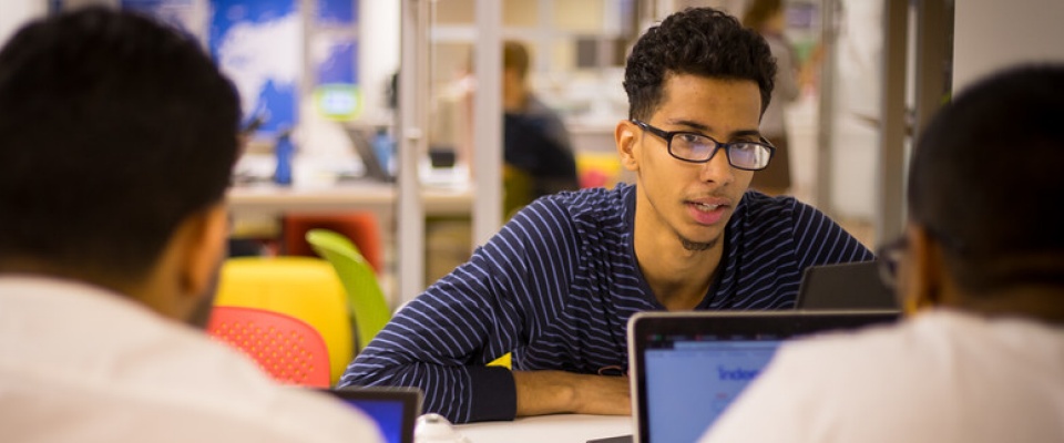 Students on computers. 