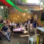 Group of people at an outdoor cafe in jamaica. 
